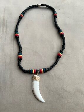 Unisex Black Beaded Necklace with White Tooth Pendant and Multicolor Accents